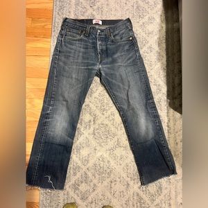 Vintage Levi’s 501 straight leg button fly jeans with frayed bottoms